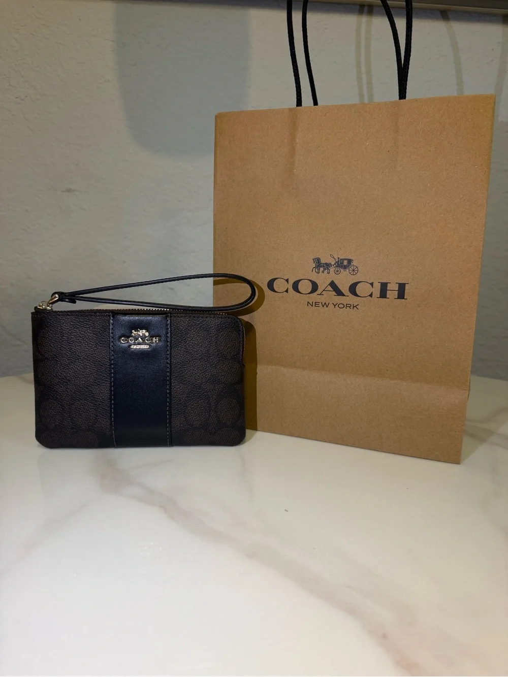 Coach Men’s Signature Wristlet in Brown with Black Trim